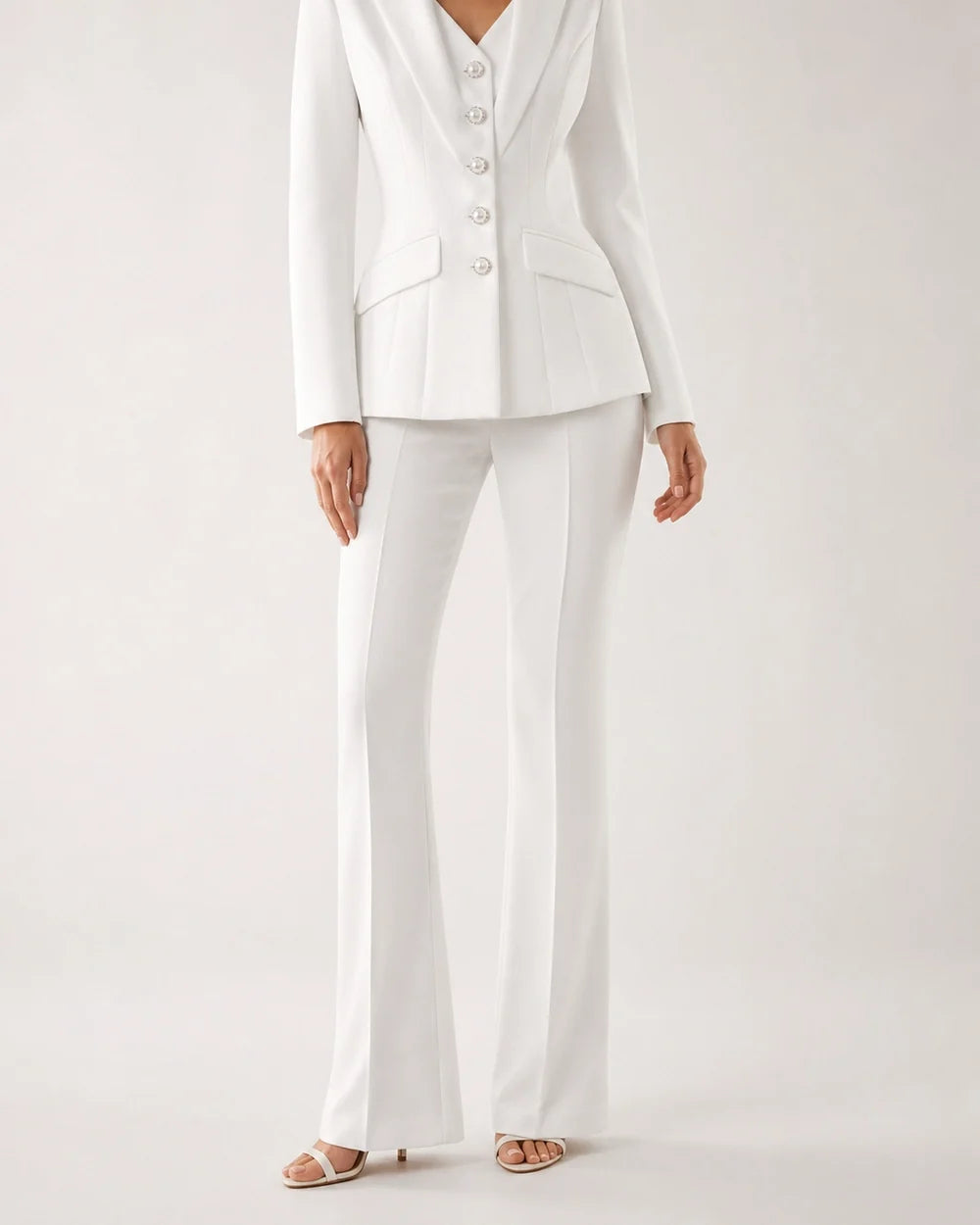 White fitted five-button blazer and trousers set for women, worn view